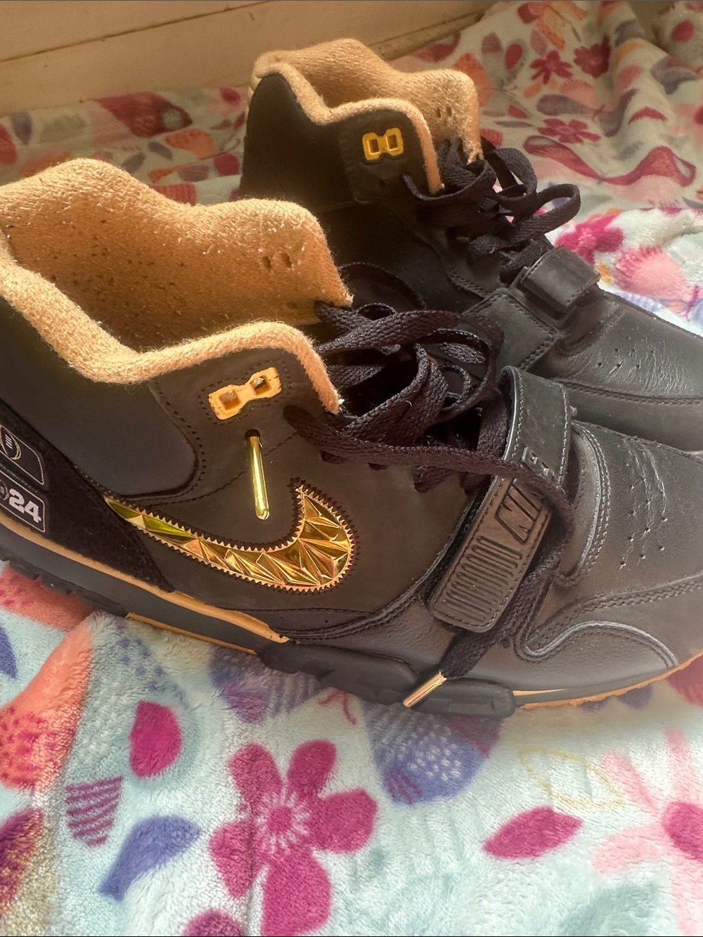 Nike  Black and Gold High-Top Sneakers with Metallic Swoosh